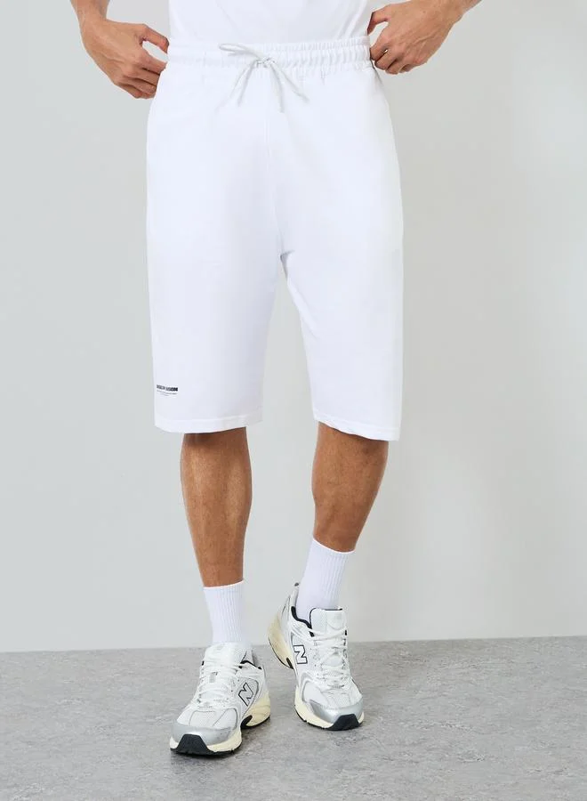 Styli  Men White Graphic Print T-Shirt and Shorts Co-Ords for Men | Best Price UAE